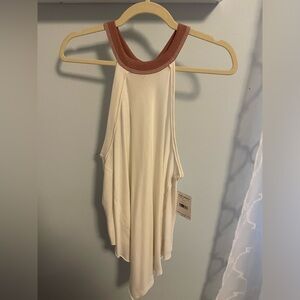 NWT Free People, size medium. Off white and mauve top